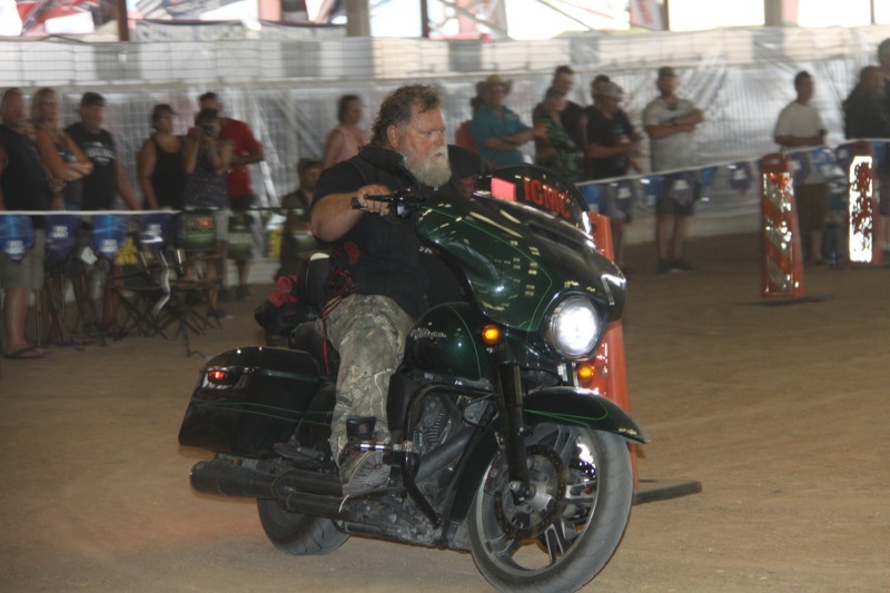 Taking a bike into inappropriate places included 900-pound Harleys barrel racing in loose dirt
