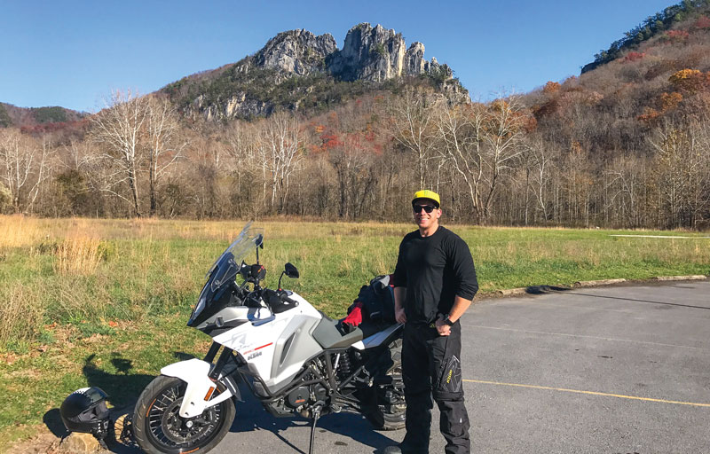 The author in front of the 900-foot-tall Seneca Rocks in the Monongahela National Forest.