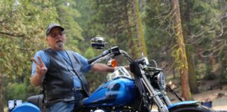 Ron Easton from Crystal Falls was overjoyed when his ticket was called for the grand prize which was an Electric Blue 2018 Softail Low Rider