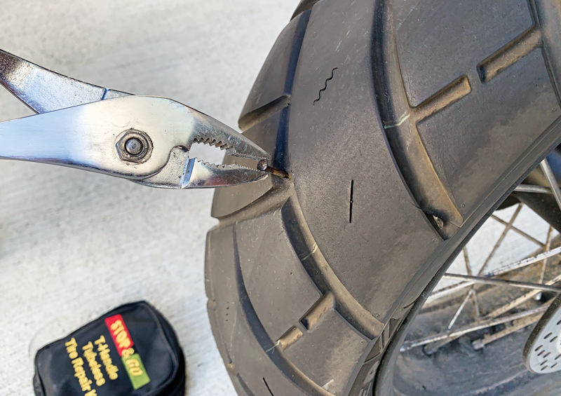 plug repair a motorcycle tire
