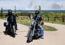 Pandemic be Damned! Dave Roe from V-Twin Visionary on the 2020 Low Rider S and Kent Prentiss of Radflagz on his custom chopper outside of Durango, Colorado. A sign of the times with a forest fire burning in the background.