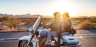 Riders Gregory Ormson and Debbie Iozzo in the golden moment on Arizona's I-8.