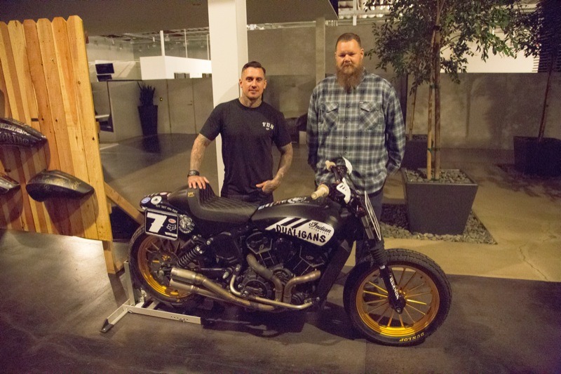 Carey Hart and his Good Ride partner Big B with one of the many cool Indian motorcycles on display at the industry party Thursday night