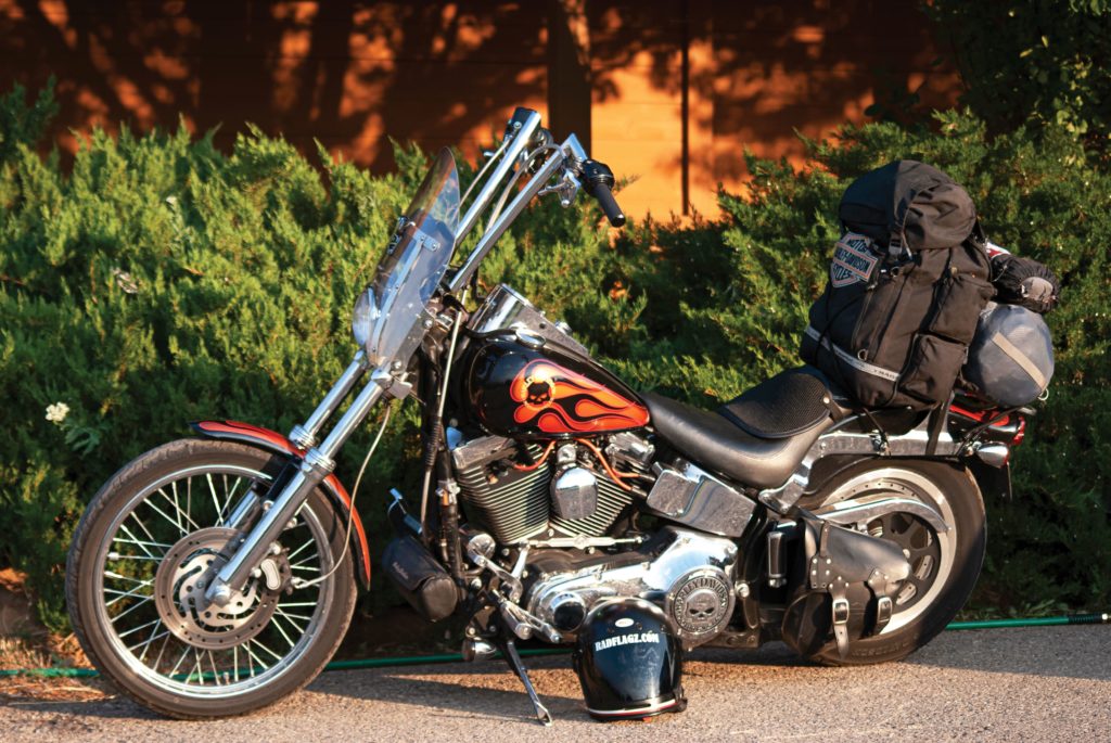 Prentiss’ custom chopper basked in early morning light near the four corners at John Oakes’ house. 