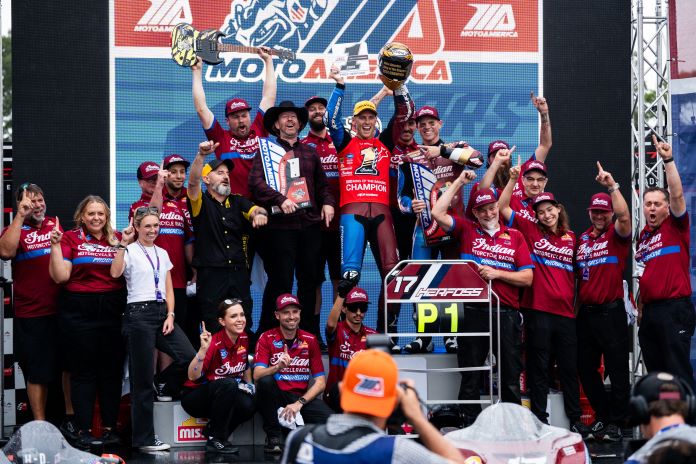 Herfoss championship podium celebration