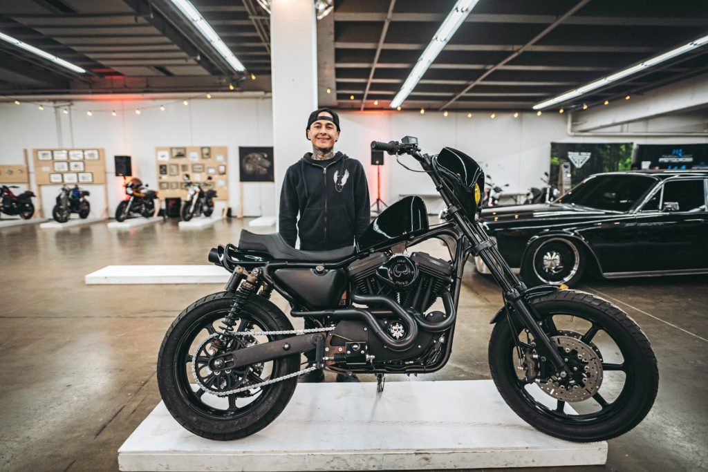 This tall Sportster is a cross-up between a motocrosser, supermoto racer and streetbike. Built by the Suicide Machine Company out of Long Beach, CA, the ’98 H-D XL1200S features a S&S Cycle Hooligan 1250 kit, SMCO stainless dual exhaust with Cone Engineering mufflers and Roland Sands Design Morris Mag wheels. 