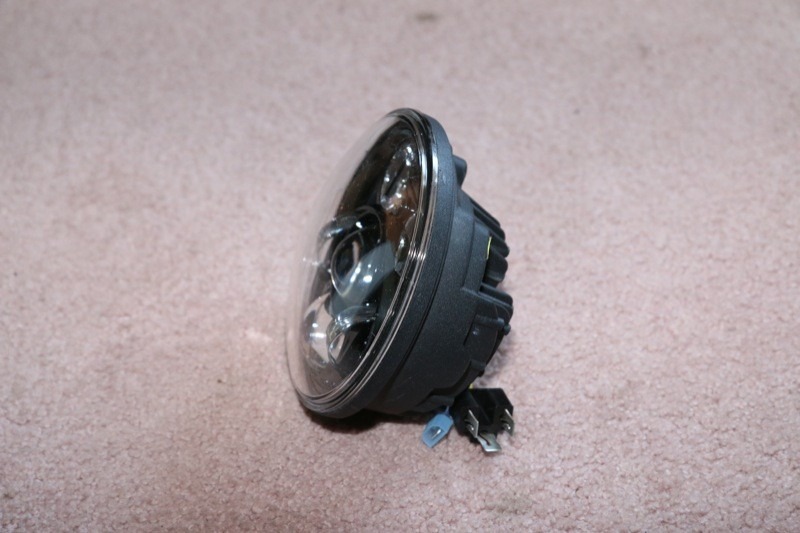 The Daymaker has no external ballast nor does it have an additional wiring harness. It just plugs right in.
