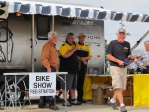 John Parham and Tony Rusteberg present Robert Westercamp with the award for Best of Show