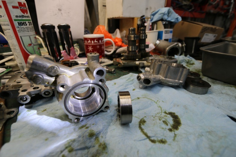 The oil pump and gerotor surfaces were scored by debris passing through the oil circulation system