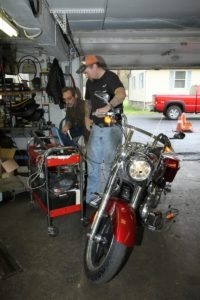 Sussex Hills Ltd.'s Norm Gross and Matt Liptak upload data to the TMax Auto Support software